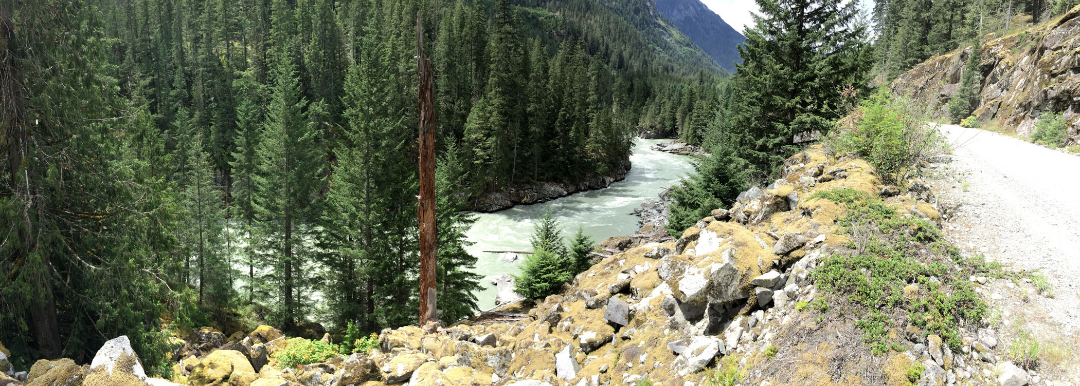 River running through forested valley in Canada